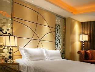 Haishu Taosheng Yiju Business Hotel Ningbo Exterior foto